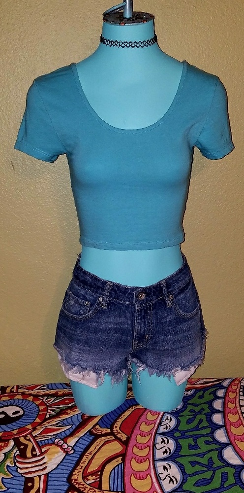 Turquoise crop top.